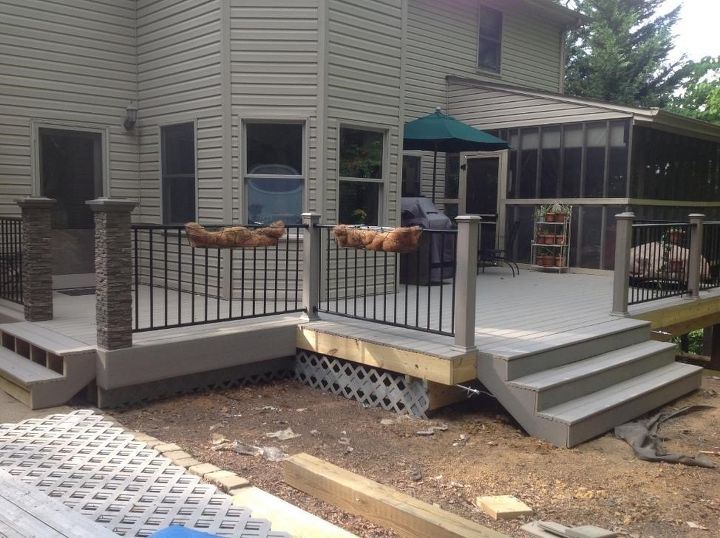 replacing old wooden deck with composite deck, concrete masonry, decks, outdoor living, The new deck is almost finished in this photo