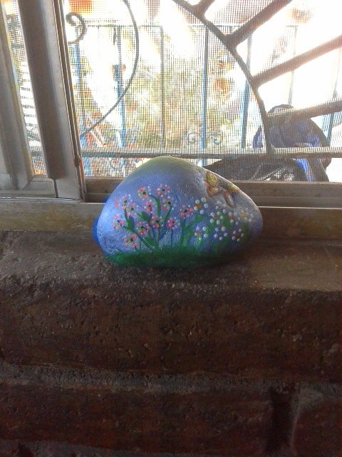 q using varnish or mug pod to finish rock painting, crafts, My first rock painting I took the rock from my husband s friends house his mother passed away like a year ago and he took over his mother s graden I have seen some rock painting in hometalk thought it will be nice