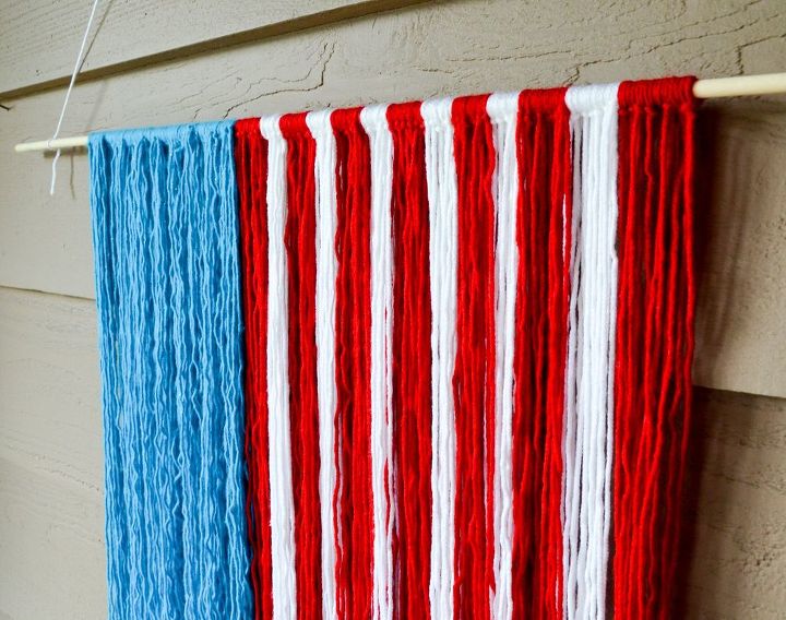 red white and blue yarn hanging, crafts, outdoor living, patriotic decor ideas, repurposing upcycling, seasonal holiday decor, wall decor