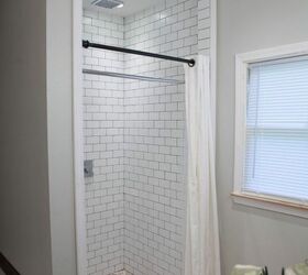 aaron heather s rustic renovation, bathroom ideas, flooring, kitchen backsplash, rustic furniture, wall decor, woodworking projects, Shower features 5th Avenue Subway Tile