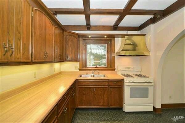 can you put a gas cook top on a counter over a dishwasher, This is before we moved in The range hood has since been painted with a hammered metal paint to match the stainless appliances But there is the stove location where I d like to put a dishwasher under the counter and a gas stove top above