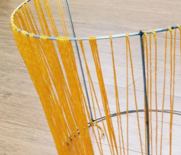 diy woven basket from a tomato cage, crafts, diy, home decor, Bring yarn over and under