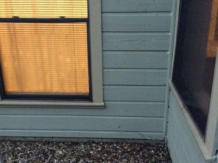 q how to prevent water in the house during rain, home maintenance repairs, this is the outside of the spot where the water comes in