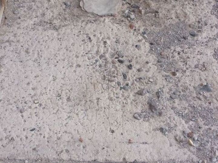 q cement sidewalk crumbling, concrete masonry, home maintenance repairs, The top layer of cement is gone leaving the aggregate exposed