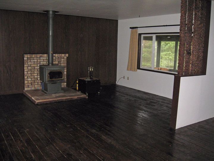 hardwood floor wall panelling and fireplace makeover, concrete masonry, flooring, hardwood floors, living room ideas, wall decor, First step staining the wood floor