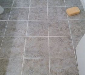 bathroom floor update for 30 budget and renter friendly, bathroom ideas, flooring, tile flooring, tiling, Working on the grout