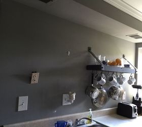 blank wall above kitchen sink