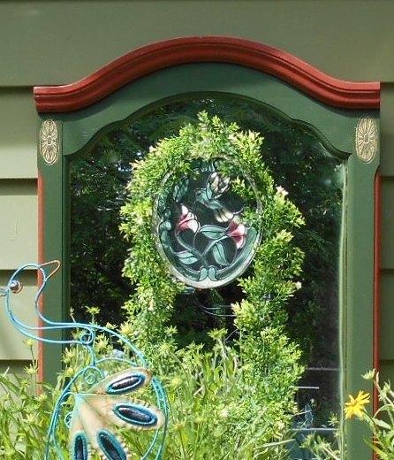 mirror on the garden wall, gardening, outdoor living