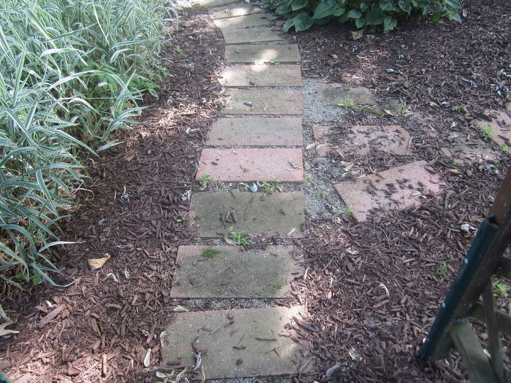how to clean a garden s brick walkway