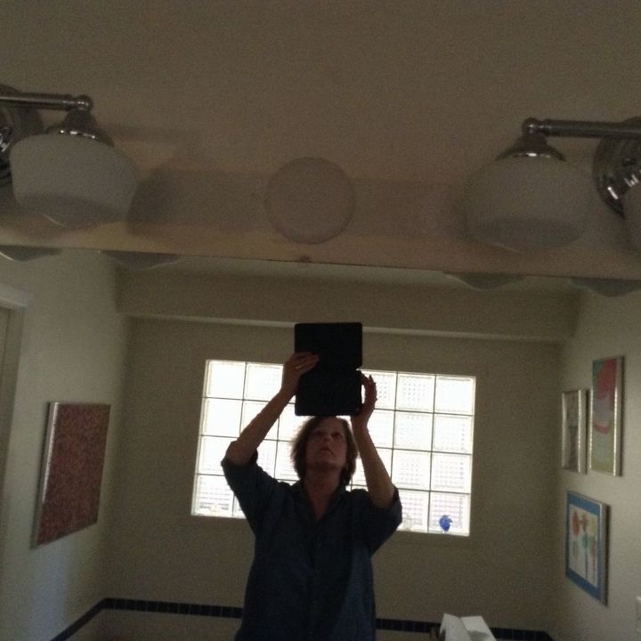 how to disguise a junction box cover over the bathroom mirror, Ugly junction box