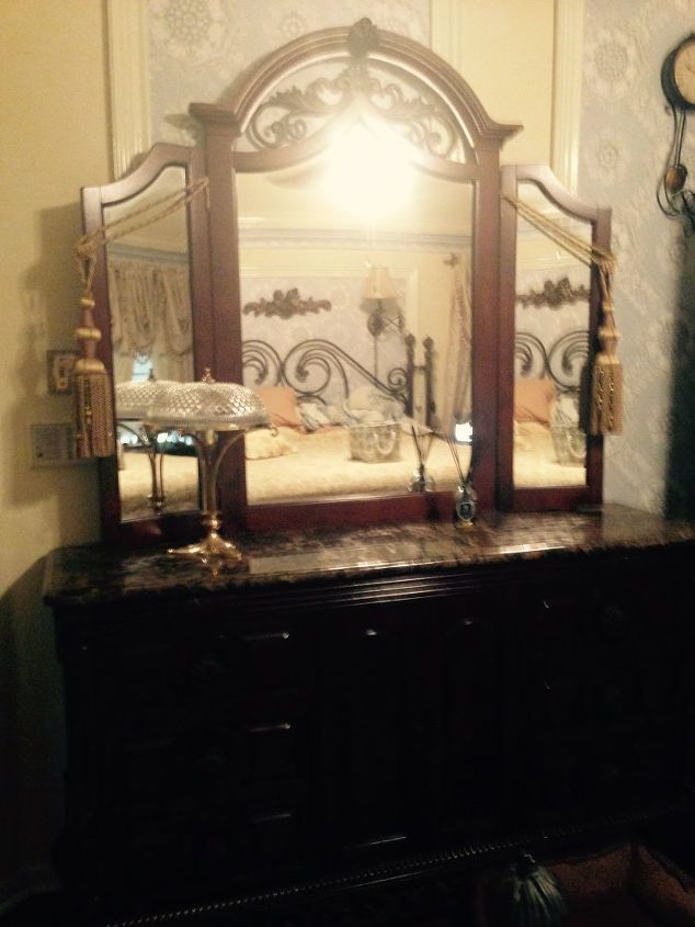 ways to update my mediterranean bedroom furniture, I know removing the mirror from the dresser would help but there s still that dark marble top and all the iron scrollwork at the bottom