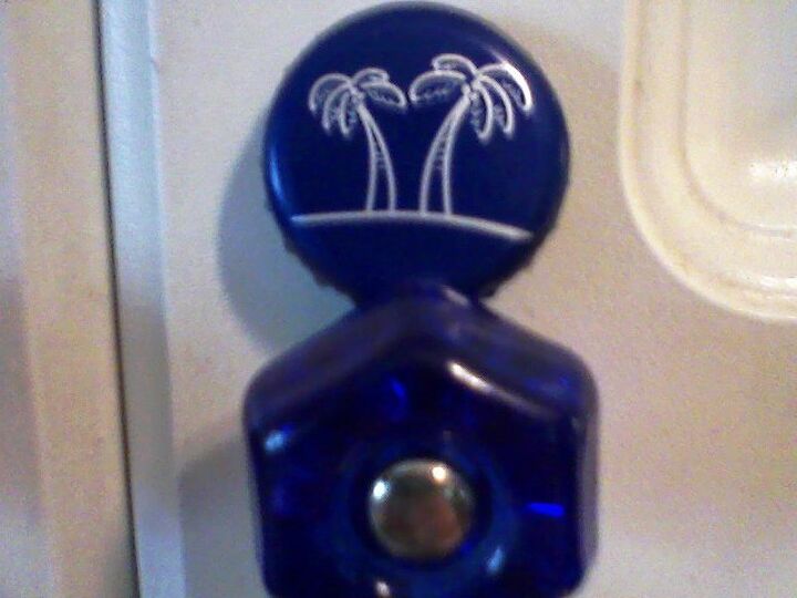 q using bottle caps as cabinet knobs, kitchen cabinets, kitchen design, repurposing upcycling