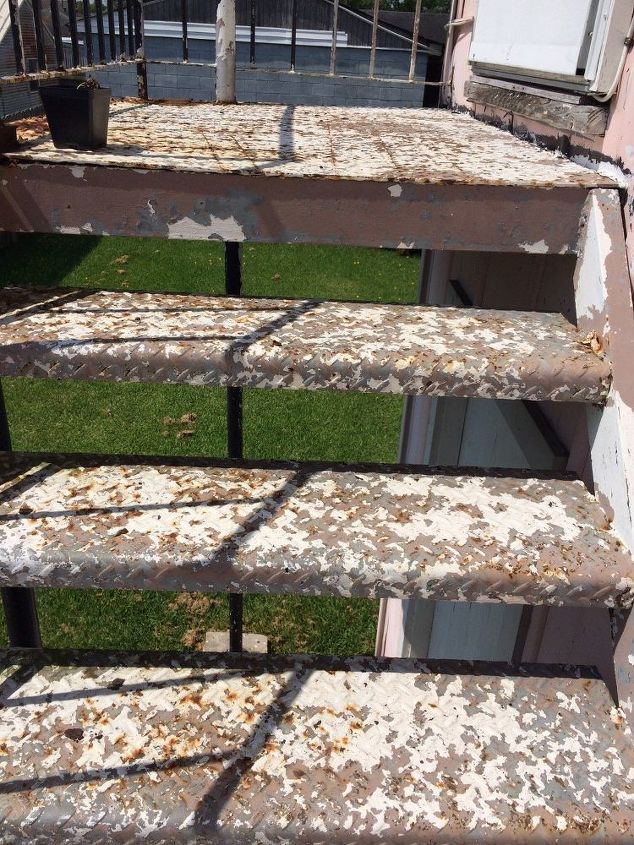 anyone know a quick solution to removing rust off an iron stairwell, Does not even have to be perfect