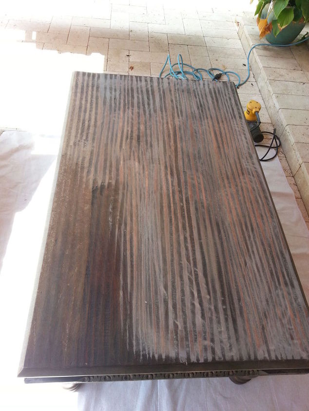 from weathered to coastal patio table, Original table after I began sanding it