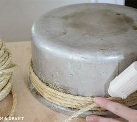 Bring an old pot into your bathroom for a cute storage trick