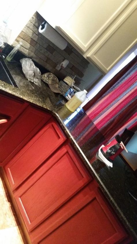q how to brighten spice red cabinets, kitchen cabinets, kitchen design, painting, Galley style took a cooked photo to show top and bottom please ignore the remodeling mess