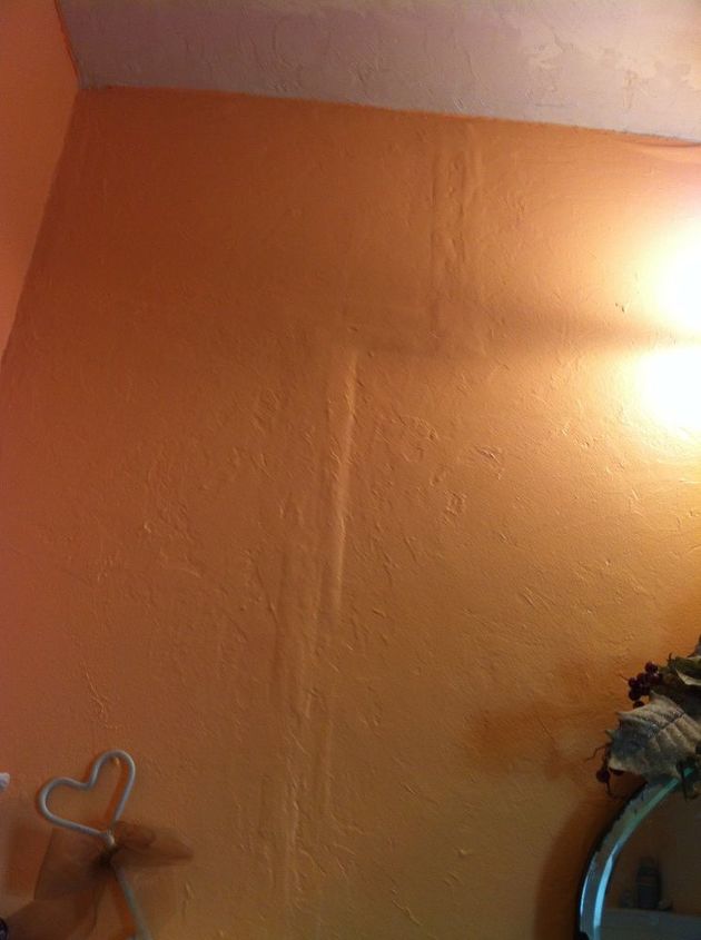 how to fix a bad taping mud job without totally re doing it, Bathroom wall with ridges where the tape mud is on the sheetrock