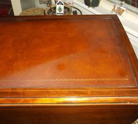 how do i clean a leather top on a table