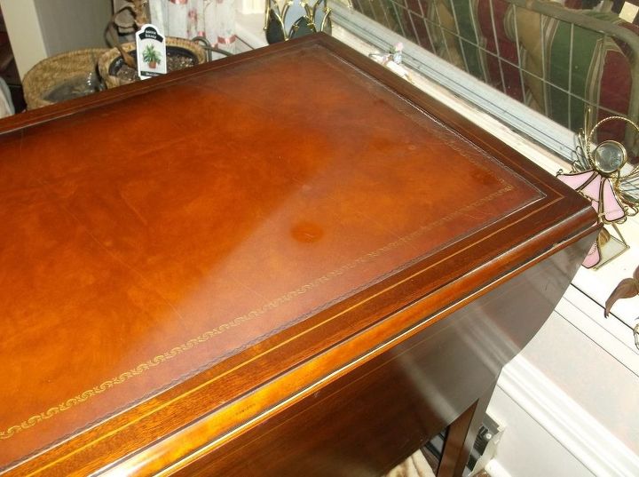 how do i clean a leather top on a table