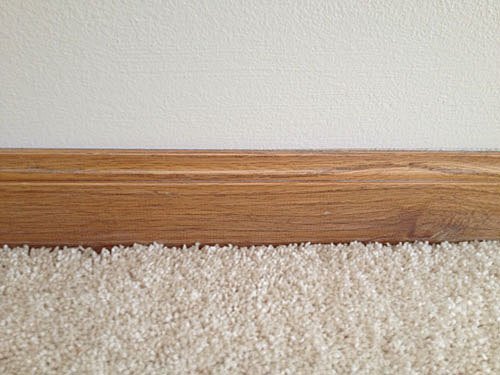 how to paint baseboards without getting paint on your carpet, Before we moved in