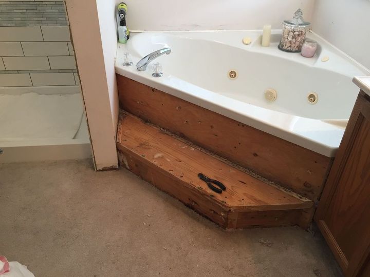 carpeted bathroom gets a new tile floor