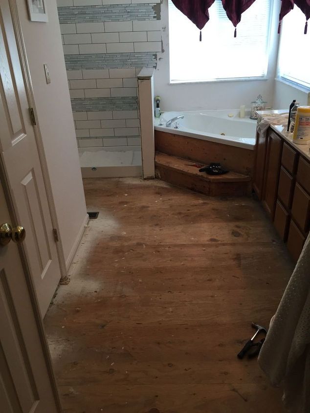 carpeted bathroom gets a new tile floor