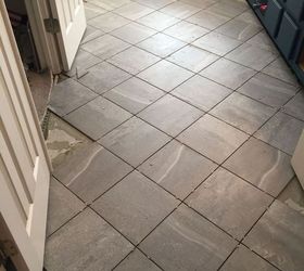 carpeted bathroom gets a new tile floor