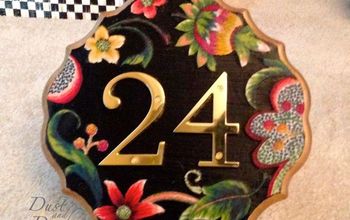 Cartel decorativo con el número de la casa