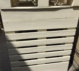 unsightly air conditioner covered with pallets and double as a planter, container gardening, gardening, hvac, pallet, repurposing upcycling