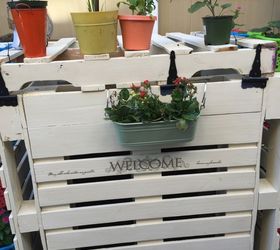 unsightly air conditioner covered with pallets and double as a planter, container gardening, gardening, hvac, pallet, repurposing upcycling, This side just have one basket to let me pas