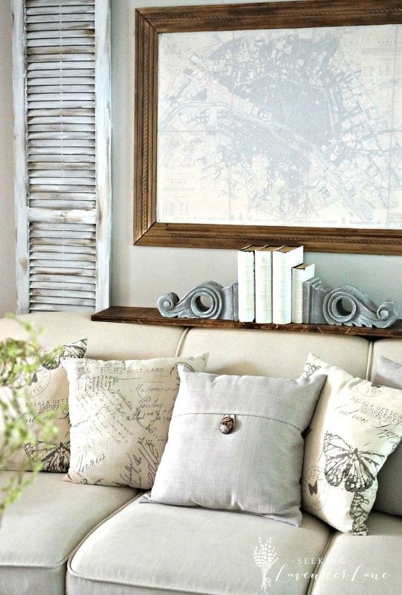 adding faux painted shutters french rustic touches behind the couch, painted furniture, repurposing upcycling, rustic furniture, wall decor
