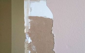 Cómo arreglar el papel rasgado de la pared de yeso