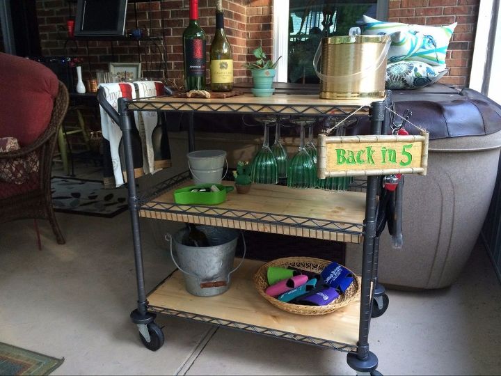 beverage cart made from a metal utility cart, Added a wine glass rack under the top shelf