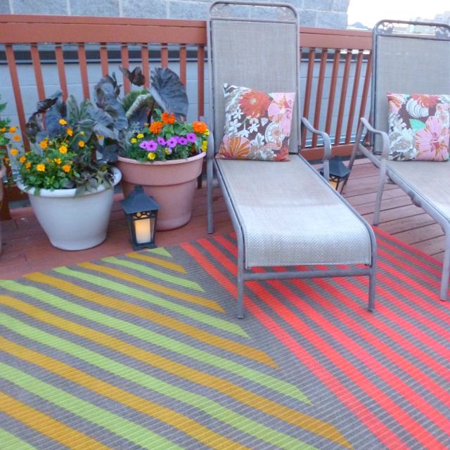 s 9 quick ways to get your dream rug on a shoestring, flooring, reupholster, Brighten an Exterior Rug With Spray Paint