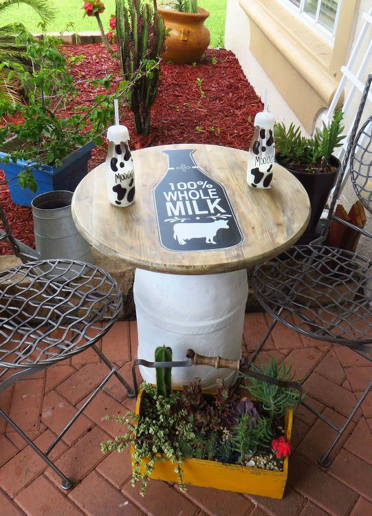11 charming things you can do with an old milk can, Turn It Into a Patio Table