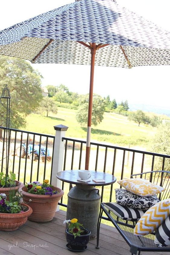 11 charming things you can do with an old milk can, Set Up An Umbrella Stand