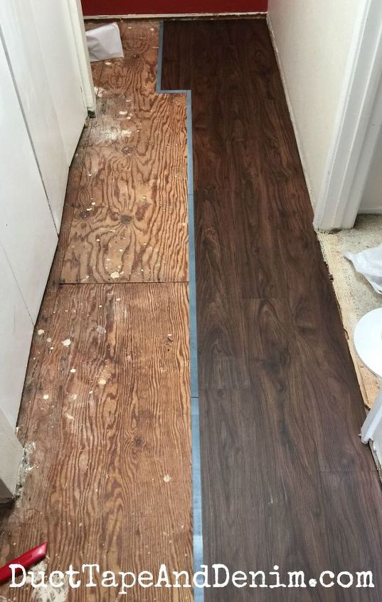 replacing the old carpet with vinyl plank flooring, diy, flooring