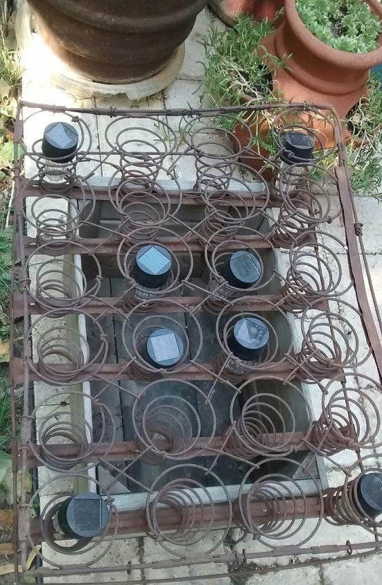 an apple box rusted out mattress springs solar lights cuteness, container gardening, flowers, gardening, repurposing upcycling, Putting it all together
