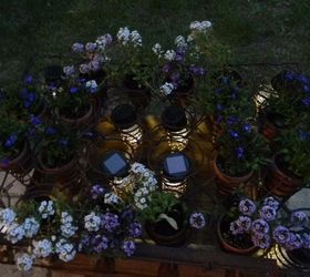 an apple box rusted out mattress springs solar lights cuteness, container gardening, flowers, gardening, repurposing upcycling, Top view at dusk