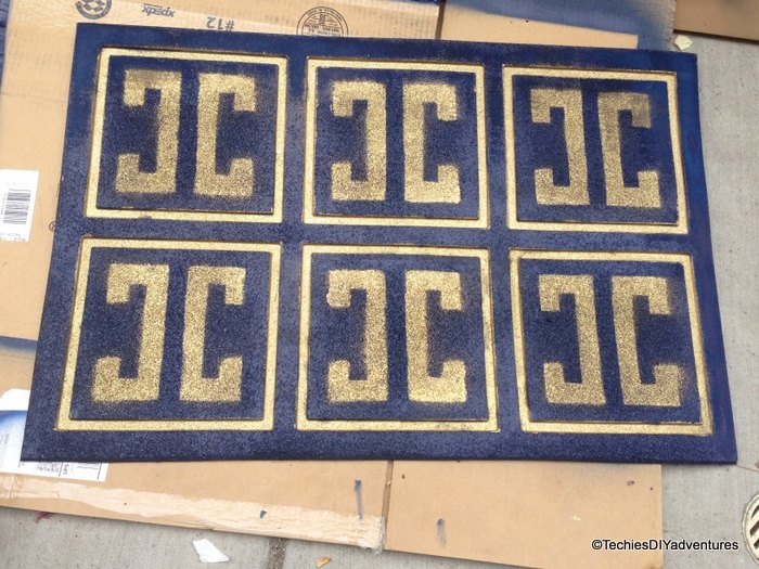give a worn out rubber mat a new life with spray paint and stencil, crafts