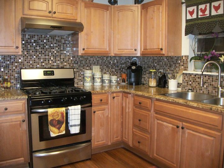 q bought this 1960 s ranch in really bad shape kitchen remodel pics, home improvement, kitchen backsplash, kitchen design, Added a backsplash and hardware to the cabinet doors