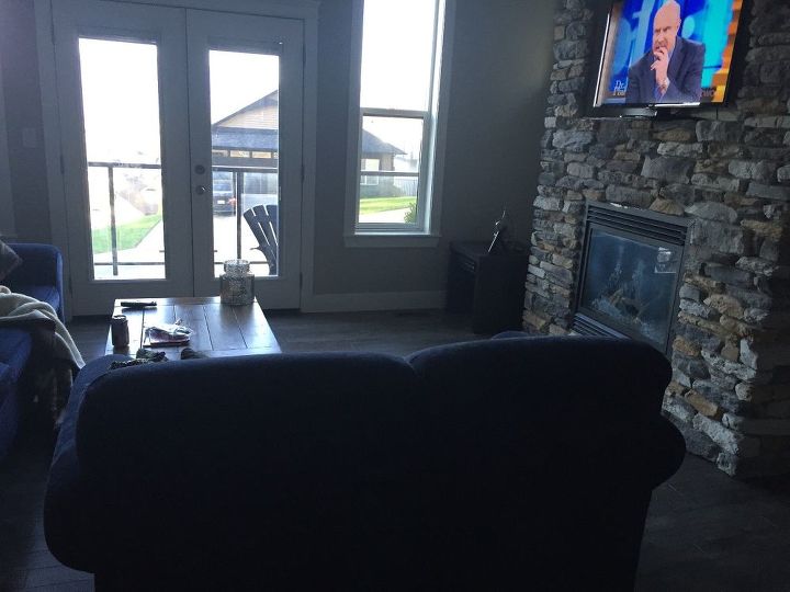 q i need some advice on options for changing my living room around, home decor, living room ideas, wall decor, I have a fireplace with tv on top and glass door that goes out to my deck