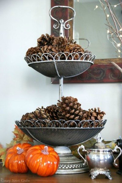 s 10 easy breezy ways to bring fall into every room, home decor, seasonal holiday decor, Display Pine Cones on Your Dresser