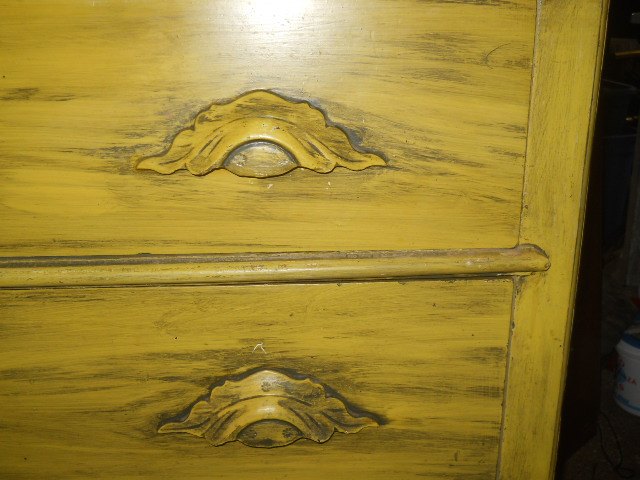 best way to accent decorative wooden drawer pulls on antique dresser