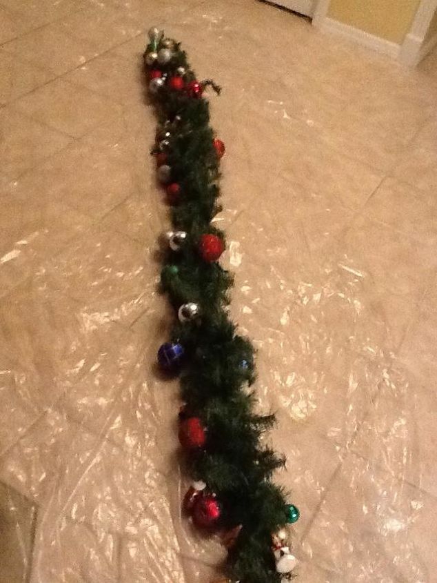 how to store christmas tree garlands, Lay garland flat on top of painters plastic