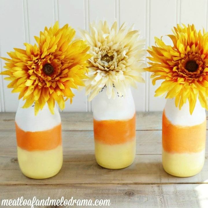 s 9 easy decor ideas inspired by delicious candy corn, seasonal holiday decor, wreaths, Yummy Painted Bottle Vases