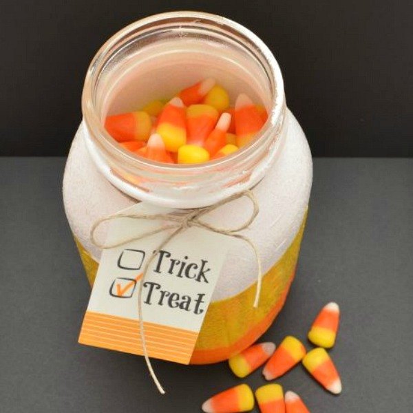 s 9 easy decor ideas inspired by delicious candy corn, seasonal holiday decor, wreaths, Mouthwatering Candy Jars