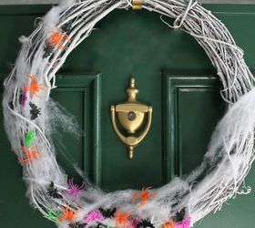 s 8 eerie halloween decorations made from unexpected things, halloween decorations, repurposing upcycling, seasonal holiday decor, A Creepy Crawly Clad Wreath
