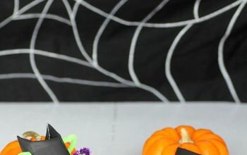 Manualidad infantil de Halloween: Arañas de papel higiénico rellenas de caramelos