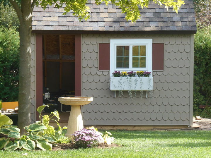 the cutest potting shed ever, diy, gardening, home improvement, outdoor living, woodworking projects, Siding trim and window box is done